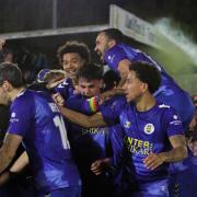 Shaun Jeffers is mobbed after scoring the winner for St Albans City at Chelmsford. Picture: SACFC