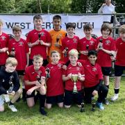The successful Sandridge Rovers U12s with the West Herts Youth League Cup. Picture: AG STUDIOS