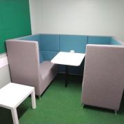 Furniture donated by Amthal, in a small meeting room.