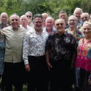 Barbershop chorus members at a Gig in the Gardens Sing-Out in Redbourn