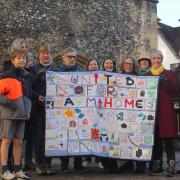 Daisy Cooper MP and the St Albans District Friends of the Earth quilt.