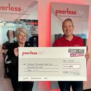 Peerless-AV presented a cheque to Young Lives vs Cancer