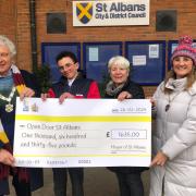The Mayor (far left) and Cllr Madoc (far right) handed the cheque to Open Door Treasurer Lindsey McLeod (2nd from right) outside St Albans City and District Council’s offices