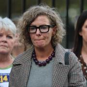 Fiona Donohoe outside Belfast Coroner’s Court at the inquest into the death of her son (Liam McBurney/PA)